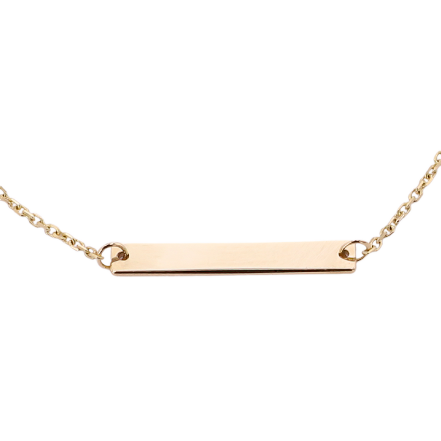 Gold bar necklace on a white background