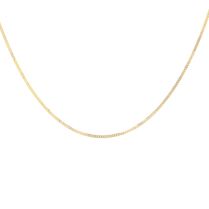 Gold chain necklace on a white background